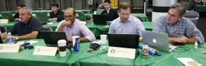 Scouting director Dan Feinstein, left, is part of the Oakland Athletics brain trust at the Major League Baseball draft along with GM Billy Beane, right, the architect of the Moneyball philosophy, June 2014. (Michael Zagaris)