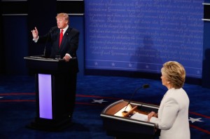 LAS VEGAS, NV - OCTOBER 19:  Republican presidential nominee Donald Trump (L) speaks as Democratic presidential nominee former Secretary of State Hillary Clinton looks on during the third U.S. presidential debate at the Thomas & Mack Center on October 19, 2016 in Las Vegas, Nevada. Tonight is the final debate ahead of Election Day on November 8.  (Photo by Mark Ralston-Pool/Getty Images)