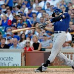 CHICAGO, IL - SEPTEMBER 17: Ryan Braun #8 of the Milwaukee Brewers hits a two run home run against the Chicago Cubs during the sixth inning at Wrigley Field on September 17, 2016 in Chicago, Illinois.  (Photo by Jon Durr/Getty Images)