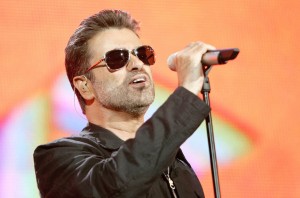 LONDON - JULY 02:  Singer George Michael performs on stage at "Live 8 London" in Hyde Park on July 2, 2005 in London, England.  The free concert is one of ten simultaneous international gigs including Philadelphia, Berlin, Rome, Paris, Barrie, Tokyo, Cornwall, Moscow and Johannesburg. The concerts precede the G8 summit (July 6-8) to raising awareness for MAKEpovertyHISTORY.  (Photo by MJ Kim/Getty Images) *** Local Caption *** George Michael