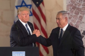 JERUSALEM, ISRAEL - MAY 23:  (ISRAEL OUT) US President Donald Trump (L) and Israel's Prime Minister Benjamin Netanyahu shake hands after delivering a speech during a visit to the Israel Museum on May 23, 2017 in Jerusalem, Israel. U.S. President Donald Trump spend his second and final day visited Mahmoud Abbas in Bethlehem, then visit the Yad Vashem Holocaust memorial and delivering an address at the Israel Museum, both in Jerusalem, before departing for the Vatican.  (Photo by Lior Mizrahi/Getty Images)